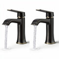 Grifo de baño moderno en acabado negro con detalles dorados 25 x 10 x 15cm